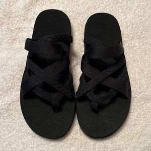 Black Teva flip flops